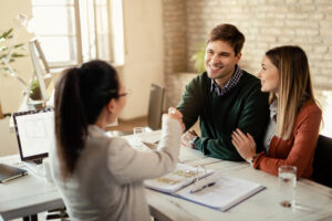 Happy customers after successfully securing their asset loan approval
