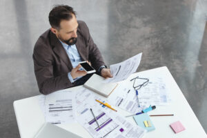 A person studying real estate investing materials