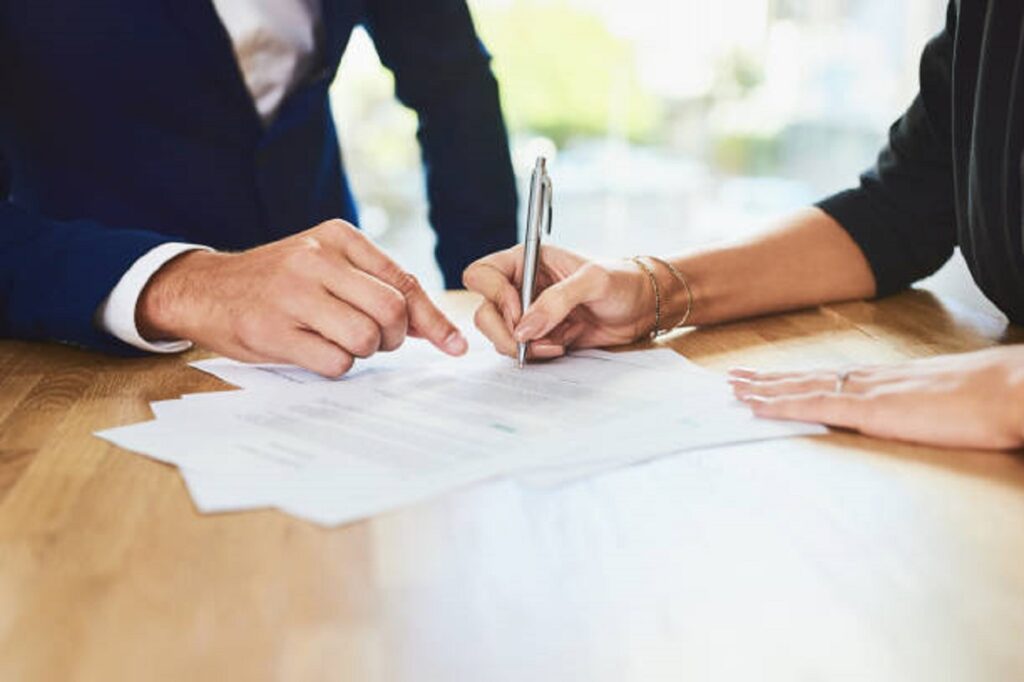 Real estate client reviewing proof of funds letters before signing