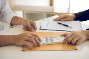 Private money loan transaction with cash being exchanged between parties