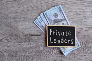 Private lenders chalkboard with cash, symbolizing residential loans