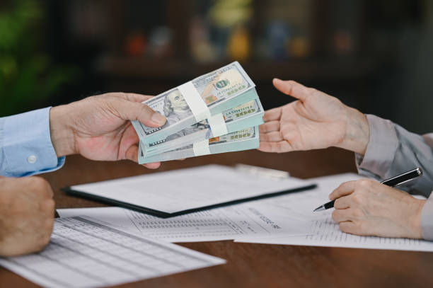 Money exchanged for bridge loan agreement with signed documents