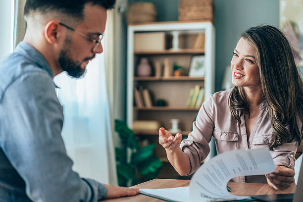 Client and lender discussing terms of a private money loan agreement
