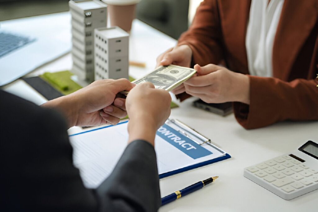 Retail property loan deal finalization with cash handover