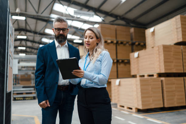 Warehouse property lender and borrower discussing loan details