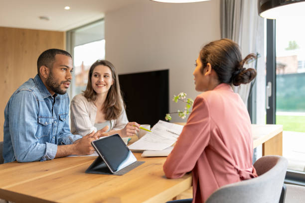 Multifamily hard money loan details being discussed between lender and clients