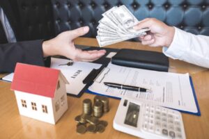Multi family mortgage lenders facilitating property transaction with funds