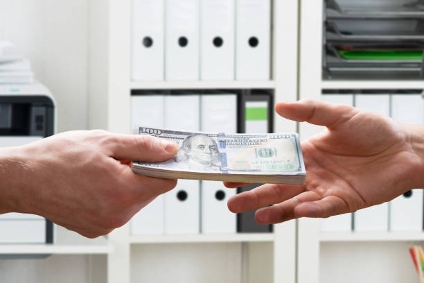 Person receiving cash as part of approved loan for office space