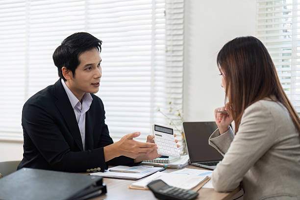 Borrower discussing private money loan terms with lender