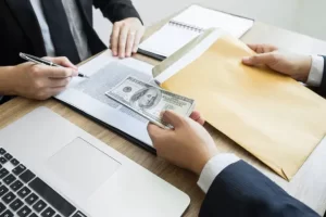 Private money lender reviewing documents for commercial loan approval