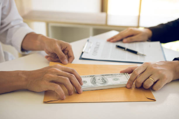 Business loan cash exchange during private lending meeting