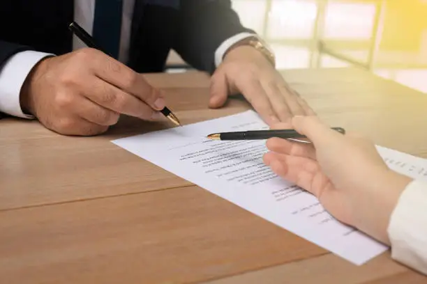 Signing loan agreement for no income verification financing option