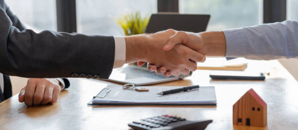 Handshake confirming approval for alternative loan without income check
