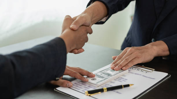 Handshake closing a private money deal for commercial financing