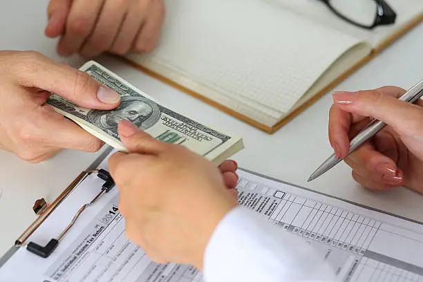 Cash transaction for no documentation loan approval and paperwork